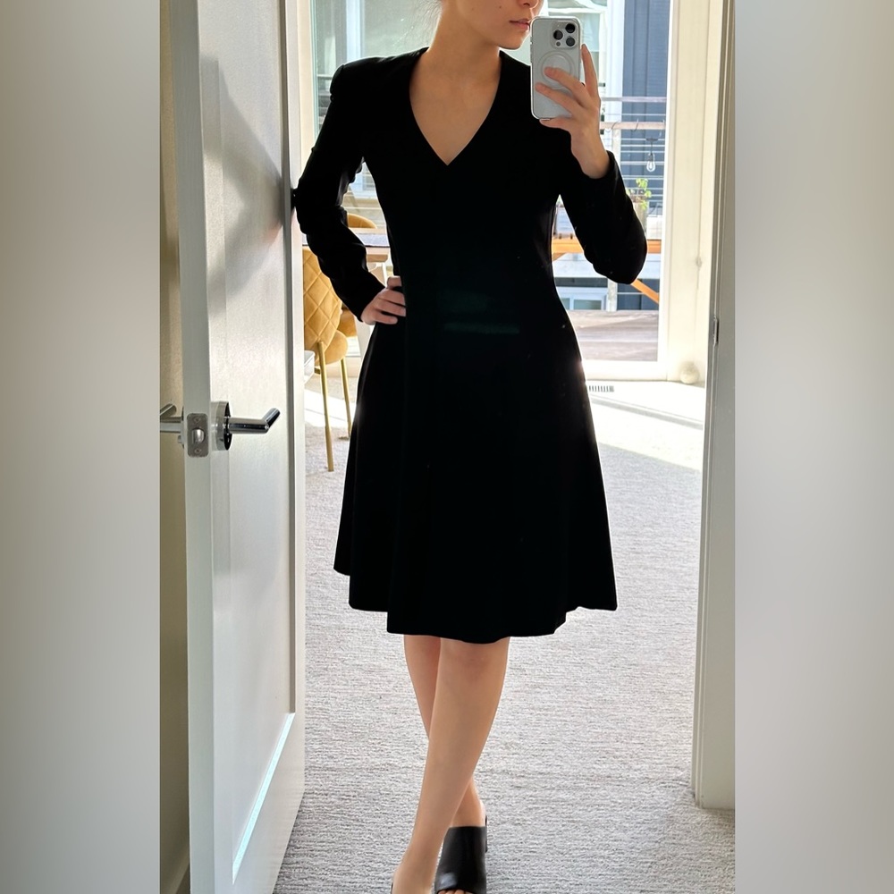 Giorgio Armani dress , size 6 but fits well for size 4 too.